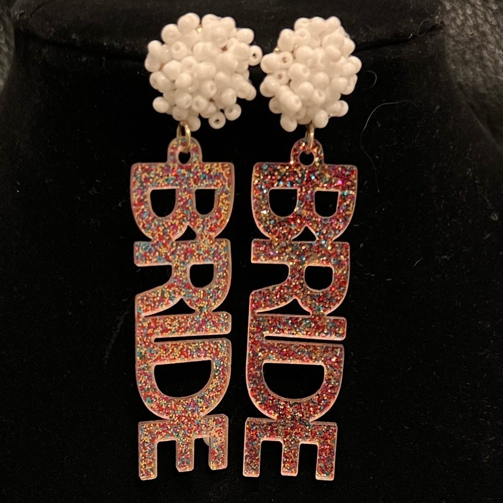 Sparkly and beaded Bride earrings.​
